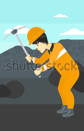 Miner working with pick. Stock photo © RAStudio