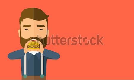 Adam mutlu yeme hamburger ofis Stok fotoğraf © RAStudio