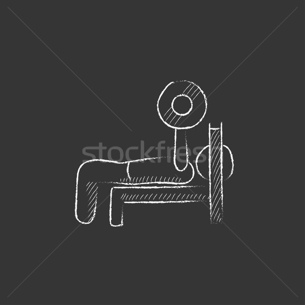 Man lying on bench and lifting barbell. Drawn in chalk icon. Stock photo © RAStudio