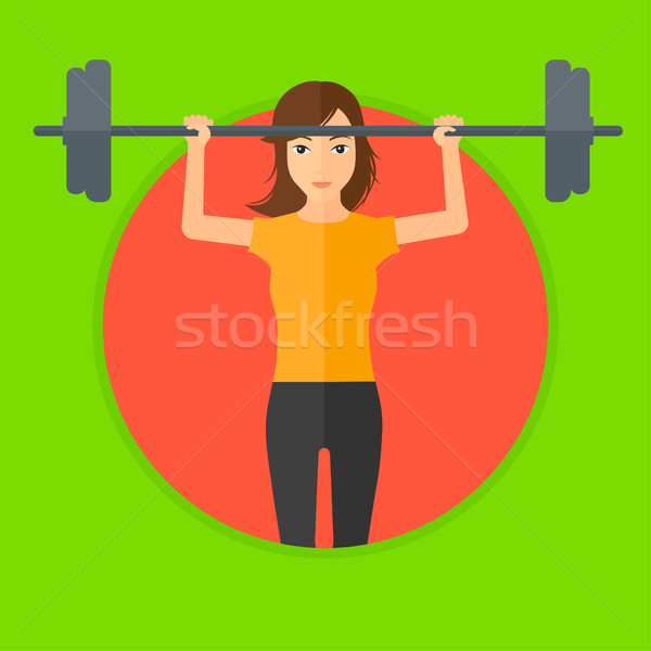 Nő emel súlyzó sportos nehéz súly Stock fotó © RAStudio