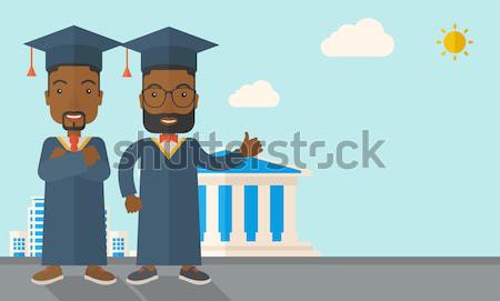 Two men wearing graduation cap. Stock photo © RAStudio