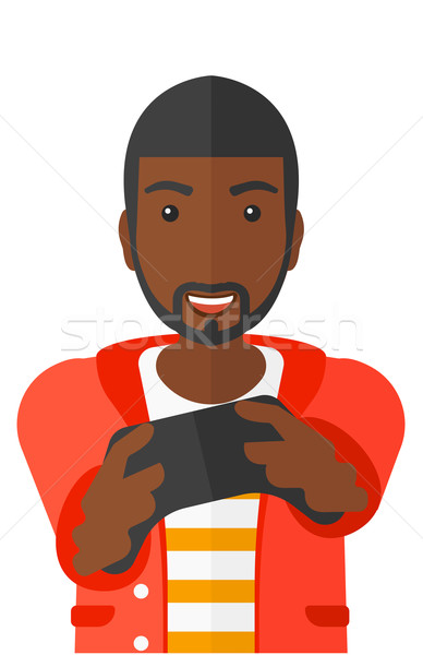 Człowiek gry gra wideo entuzjastyczny gamepad ręce Zdjęcia stock © RAStudio