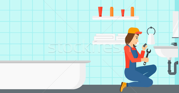 Woman repairing sink. Stock photo © RAStudio