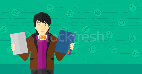 Man choosing between book and tablet computer. Stock photo © RAStudio