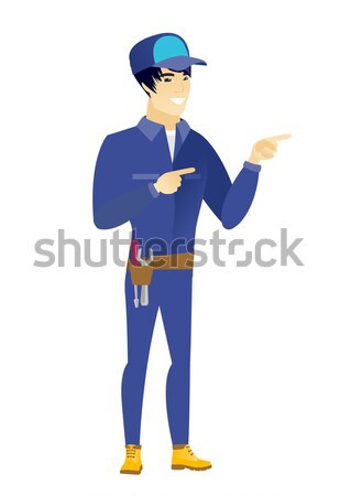 Asian builder pointing with his forefinger Stock photo © RAStudio