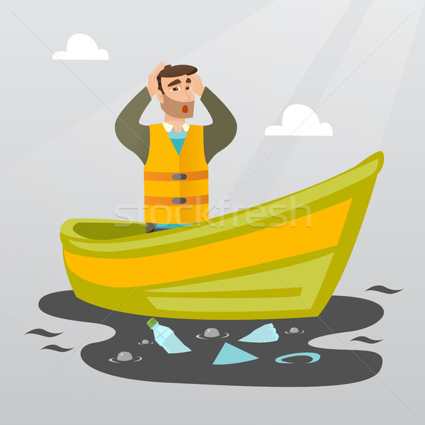 Man floating in a boat in polluted water. Stock photo © RAStudio
