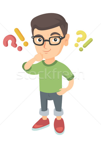 Boy standing under question and exclamation marks. Stock photo © RAStudio