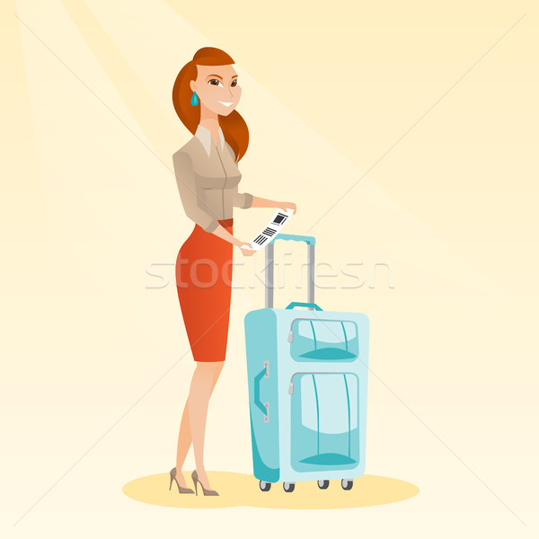 Kaukasisch zakenvrouw tonen bagage tag gelukkig Stockfoto © RAStudio