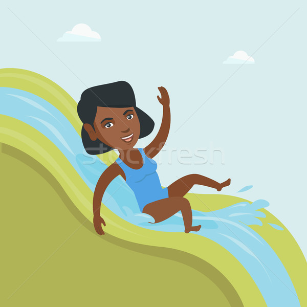Young african woman riding down a waterslide. Stock photo © RAStudio
