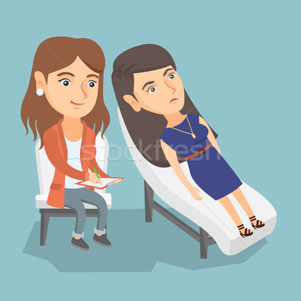 Caucasian psychologist having session with patient Stock photo © RAStudio