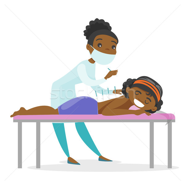 Médico acupuntura terapia mujer tratamiento Foto stock © RAStudio