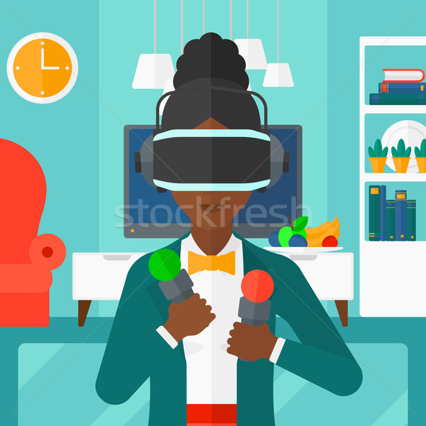 Stock photo: Woman wearing virtual reality headset.