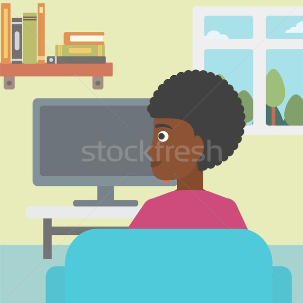 Kobieta oglądania telewizja posiedzenia kanapie salon Zdjęcia stock © RAStudio