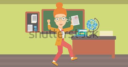 Student holding test paper with best result. Stock photo © RAStudio