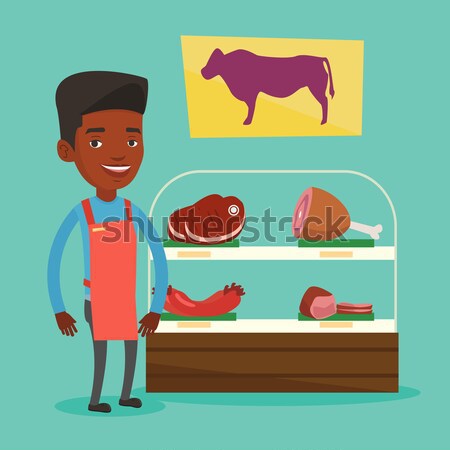 Butcher offering fresh meat in butchershop. Stock photo © RAStudio