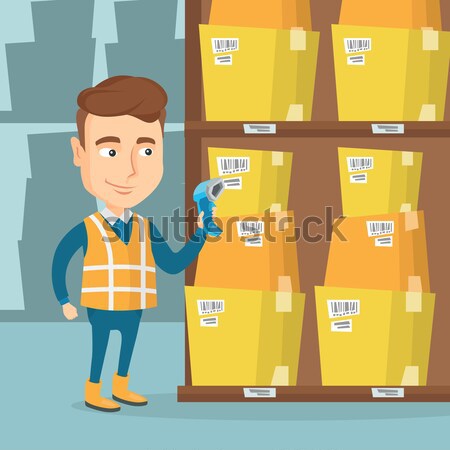 Stock photo: Warehouse worker scanning barcode on box.