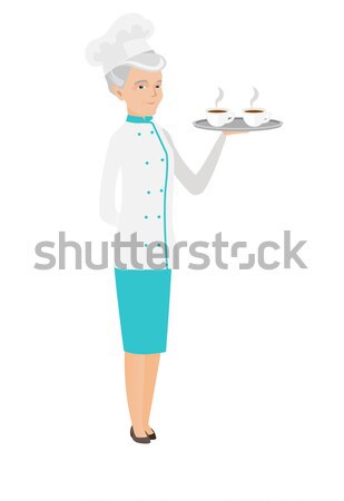 Senior caucasian chef holding tray with cups. Stock photo © RAStudio