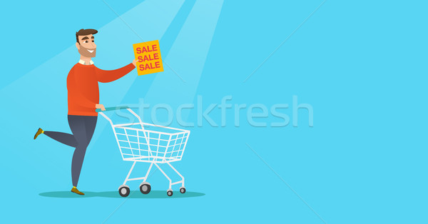 Man running in a hurry to the store on sale. Stock photo © RAStudio