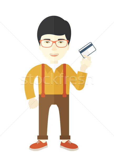 Glücklich japanisch Geschäftsmann stehen halten Kreditkarte Stock foto © RAStudio
