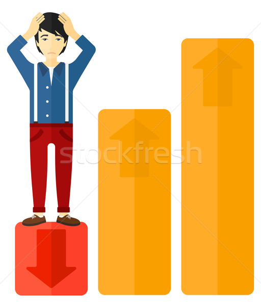 Businessman standing on low graph. Stock photo © RAStudio