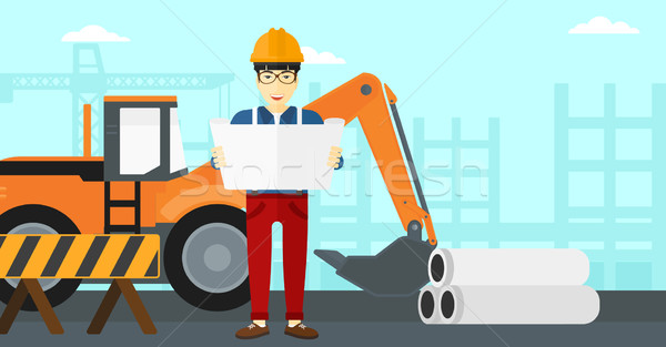 Engineer holding a blueprint. Stock photo © RAStudio