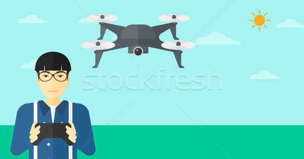 Man flying drone. Stock photo © RAStudio