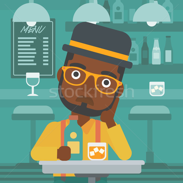 Sad man with bottle and glass. Stock photo © RAStudio