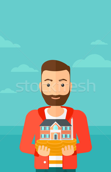 Man holding house model. Stock photo © RAStudio