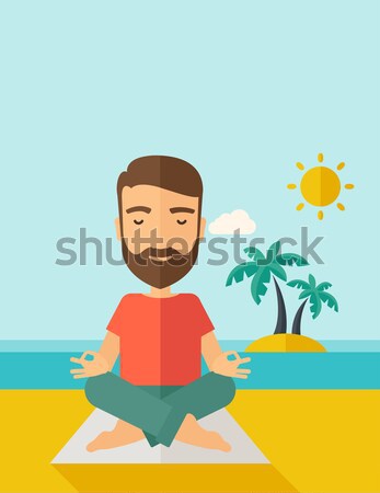 Stock photo: Man meditating in lotus pose.