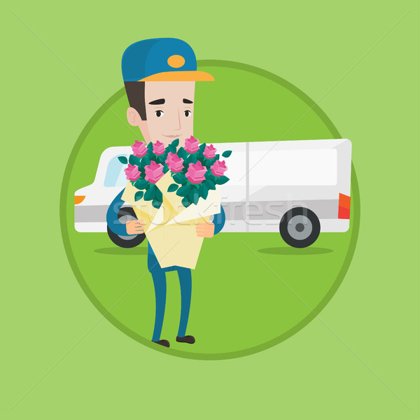 Delivery courier holding bouquet of flowers. Stock photo © RAStudio