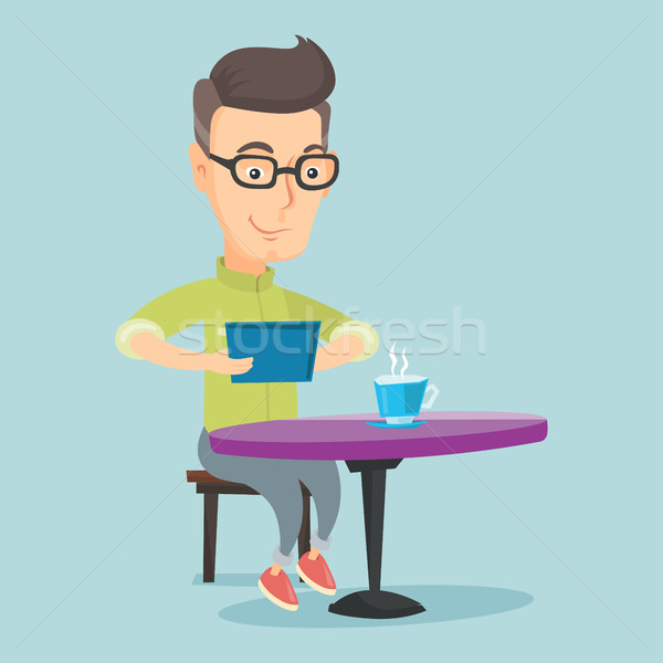 Man surfing in the social network in cafe. Stock photo © RAStudio