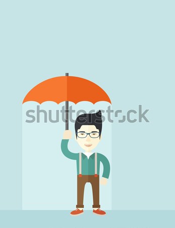 Business man insurance agent with umbrella. Stock photo © RAStudio