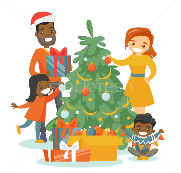 Stockfoto: Familie · kerstboom · jonge · gelukkig · vrolijk