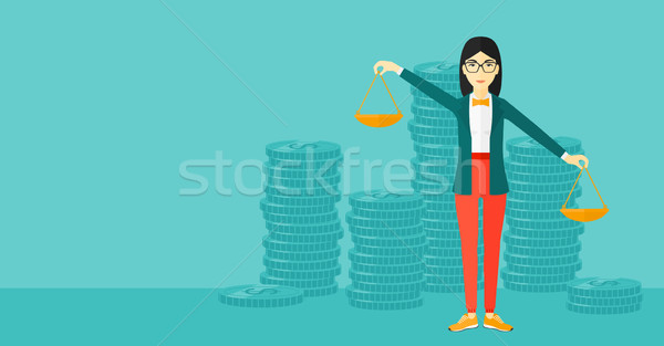 Business woman with scales. Stock photo © RAStudio