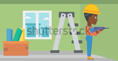 Constructor hammering nail. Stock photo © RAStudio