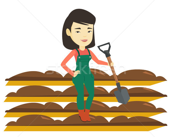 Agriculteur pelle domaine asian permanent femme [[stock_photo]] © RAStudio