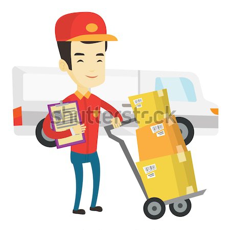 Delivery courier with cardboard boxes. Stock photo © RAStudio