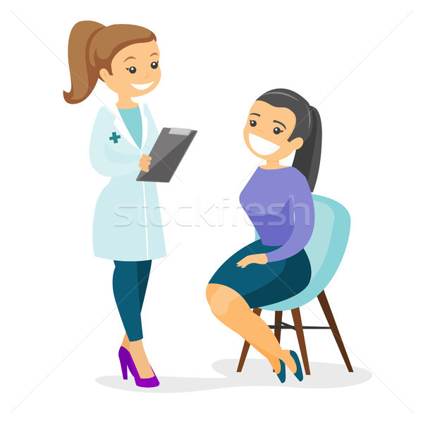 Stock photo: Doctor consulting male patient in office.