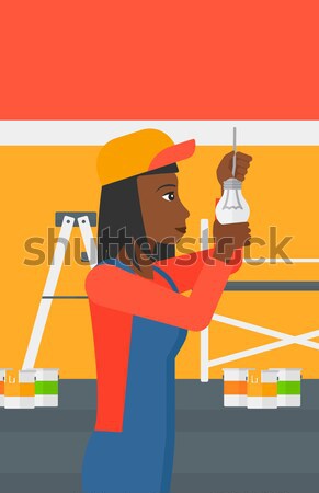 Painter with paint roller. Stock photo © RAStudio