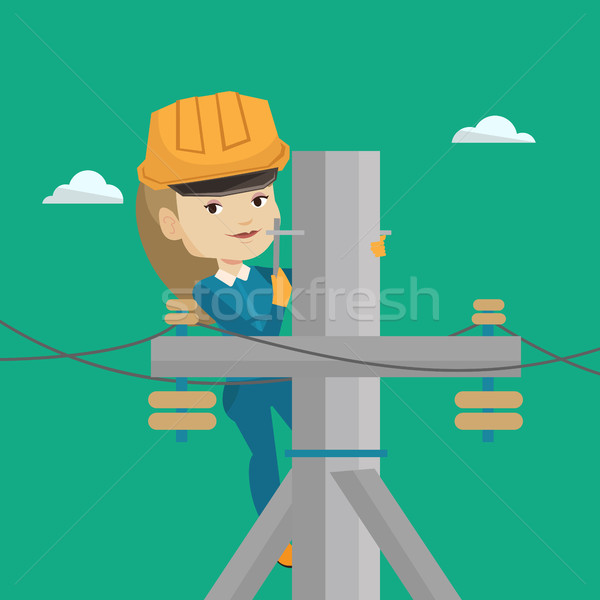 Electrician working on electric power pole. Stock photo © RAStudio