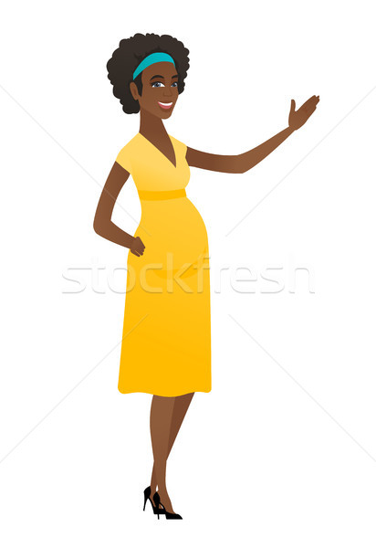 Afrikaanse zwangere vrouw tonen richting wijzend Stockfoto © RAStudio