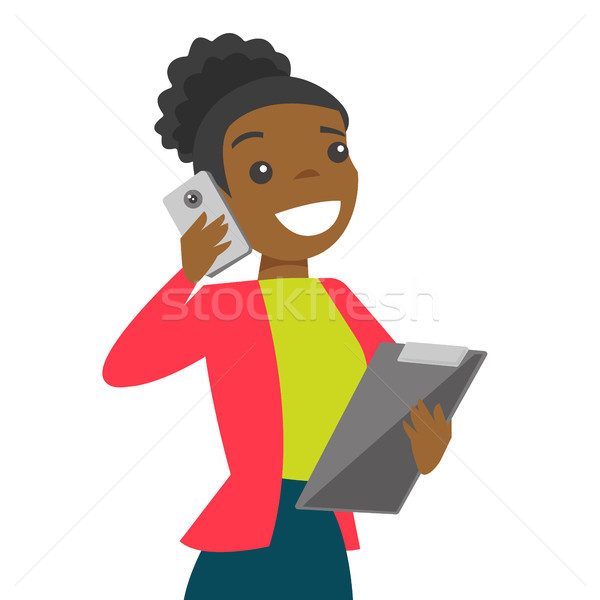 Black businesswoman negotiating on smartphone Stock photo © RAStudio