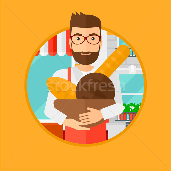 Baker holding basket with bakery products. Stock photo © RAStudio