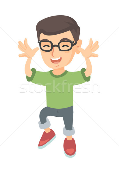 Funny caucasian boy in glasses teasing with hands. Stock photo © RAStudio