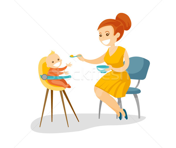 Young caucasian white mother feeding her baby. Stock photo © RAStudio