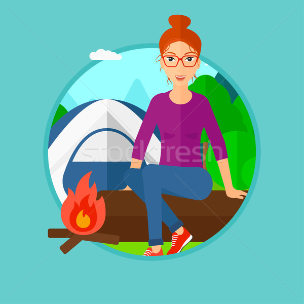 Stock photo: Woman sitting on log in the camping.