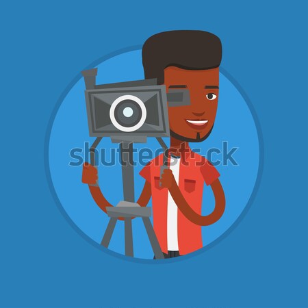 Kareraman film kamera állvány néz fiatal profi Stock fotó © RAStudio