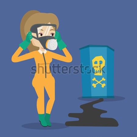 Mujer radiación traje cabeza mirando barril Foto stock © RAStudio