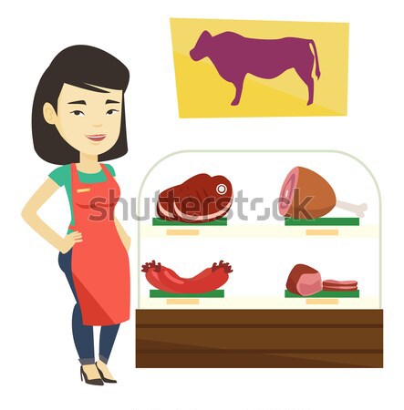 Butcher offering fresh meat in butchershop. Stock photo © RAStudio