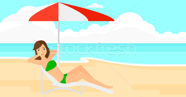 Woman sitting in chaise longue. Stock photo © RAStudio